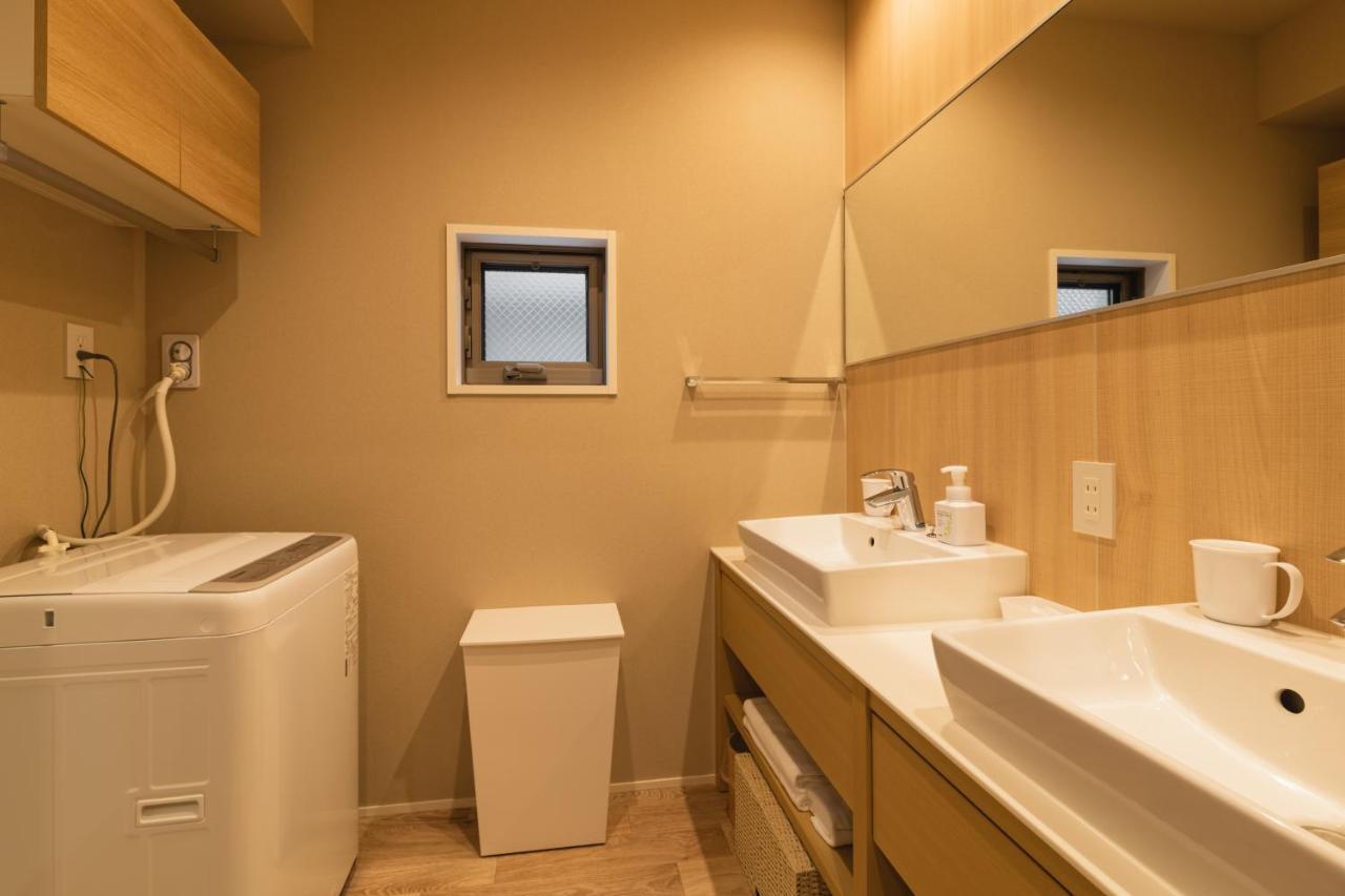 Grand Base Crane Aparthotel Фукуока Екстериор снимка