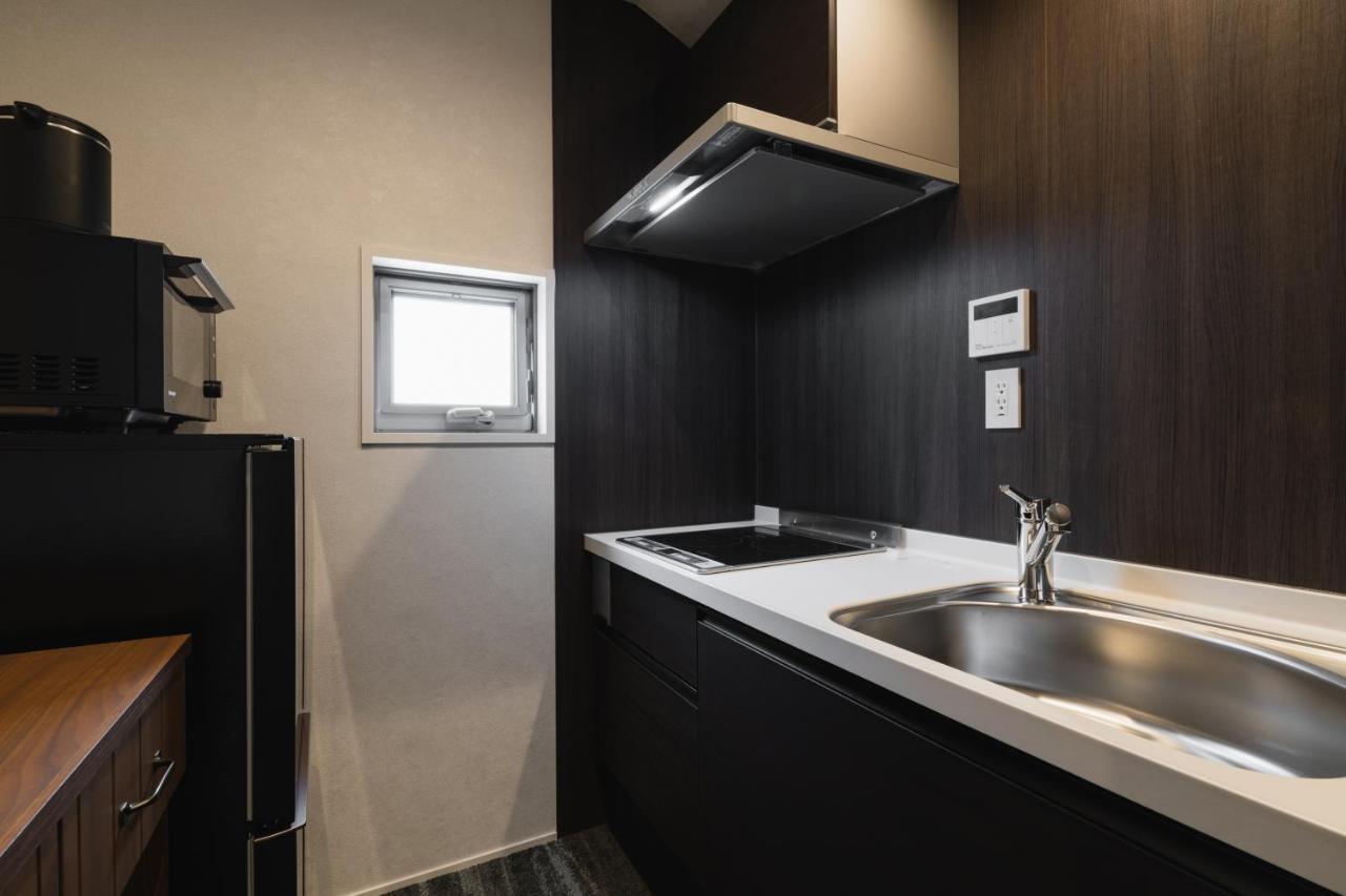 Grand Base Crane Aparthotel Фукуока Екстериор снимка
