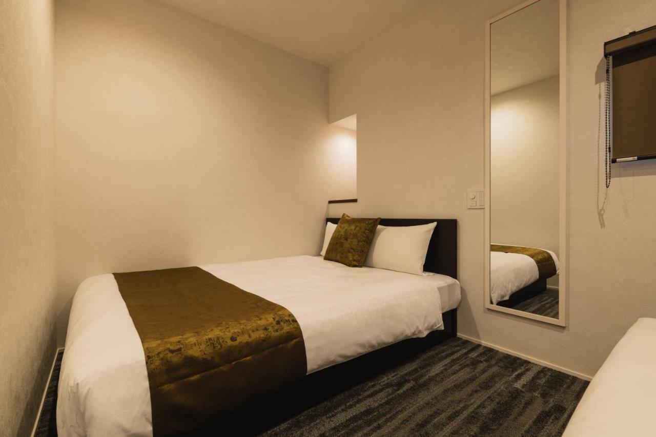 Grand Base Crane Aparthotel Фукуока Екстериор снимка